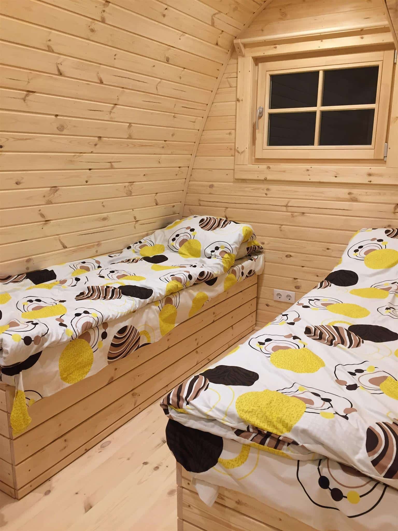 Camping pod for sale in Canada & the USA. Glamping pod for sale with side entranceSingle bed with bedding storage_2