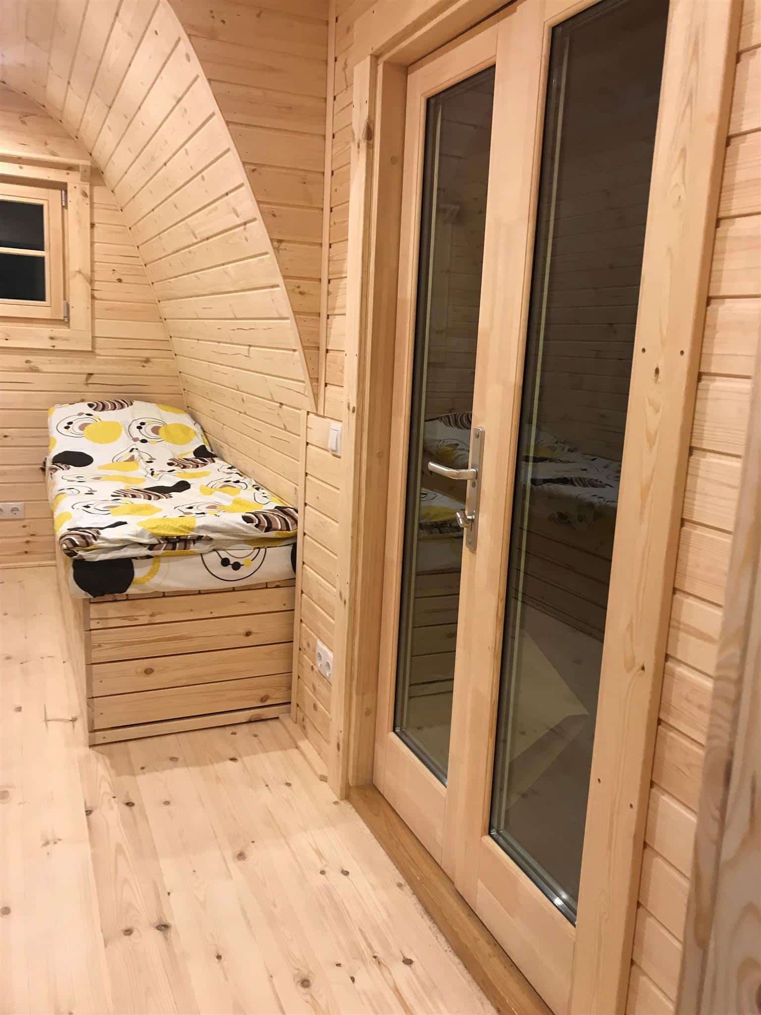 Camping pod for sale in Canada & the USA. Glamping pod for sale with side entranceSingle bed with bedding storage_3